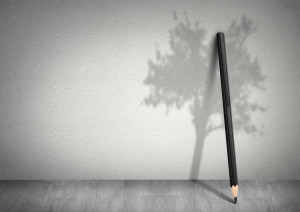 Creative ecology concept, pencil with shadow of tree